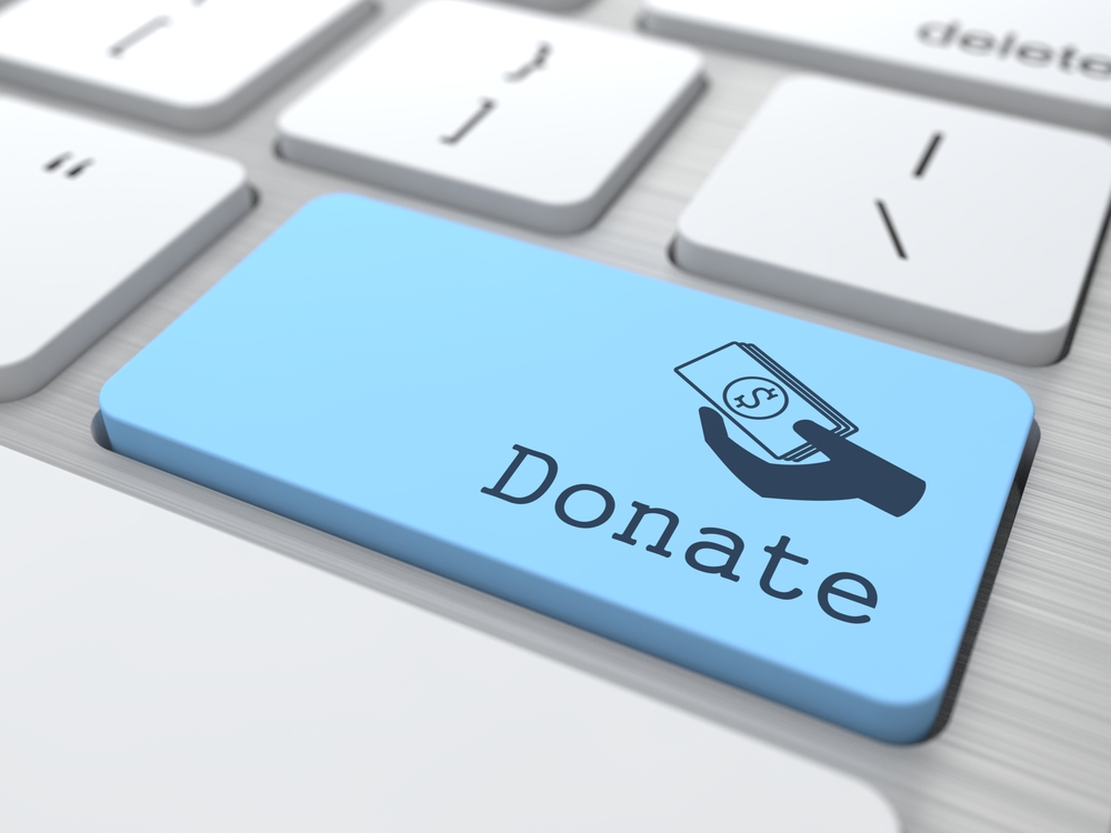 Donate Button on Modern Computer Keyboard.